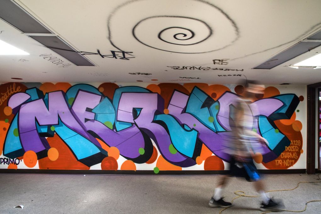 A mural by local graffiti artist Merlot in a small, upstairs room at Dozer’s Warehouse on Beacon Hill, a Seattle haven for graffiti artists. (Steve Ringman / The Seattle Times)