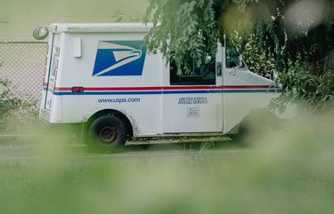 A mail delivery truck is parked outside the a post office in Darby, Pa., Aug. 13, 2020. Congressional Democrats called on top Postal Service officials on Sunday to testify on Capitol Hill this month about recent policies that they warned pose “a grave threat to the integrity of the election,” as a top administration official signaled openness to providing emergency funding for the agency. (Michelle Gustafson/The New York Times) XNYT22 XNYT22