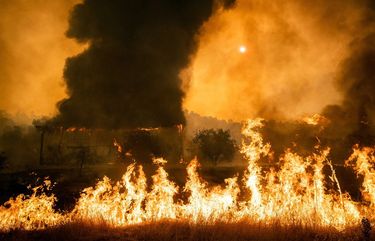 A structure burns in Vacaville, Calif., on Wednesday, Aug. 19, 2020. Thousands of people were forced to flee their homes in Vacaville, a city of about 100,000 residents near Sacramento, as a combination of uncontrolled fires continued to threaten Northern California on Wednesday. (Max Whittaker/The New York Times) XNYT81 XNYT81