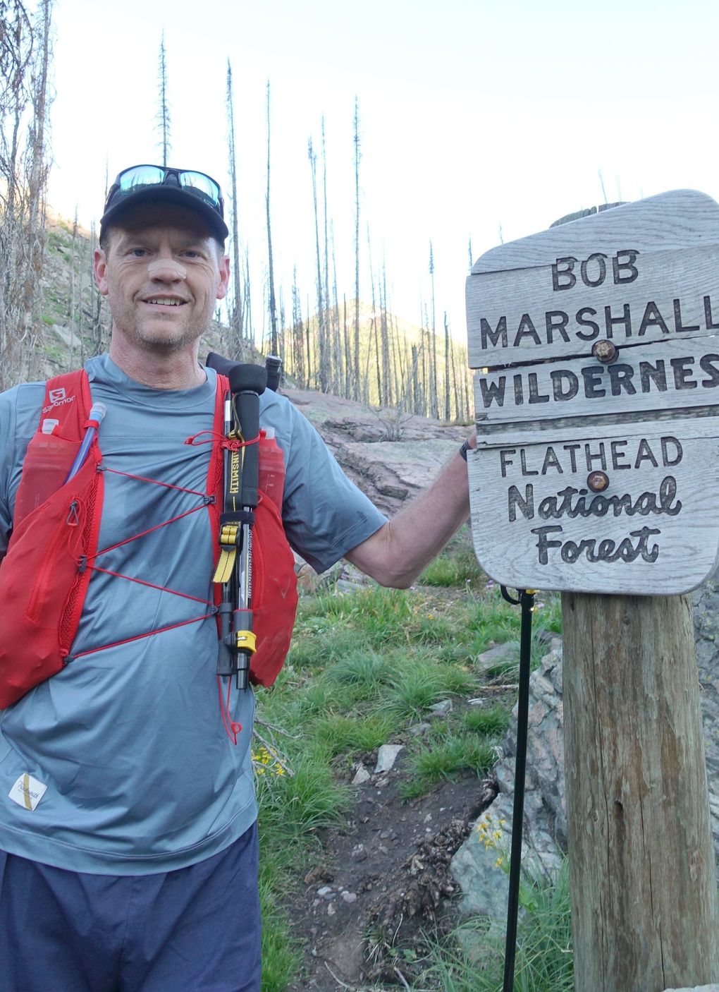 Writer Frank Field posed for a photo at the wilderness boundary, where he realized one of two lifelong goals, exploring the Bob Marshall Wilderness and running the RATBOB. (Courtesy of Frank Field)