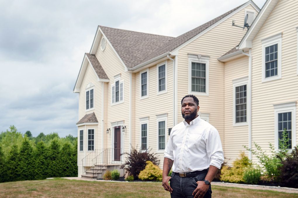 The value of Stephen Richmond’s home in a Hartford, Conn., suburb jumped after he removed family photos and movies posters, and had a white neighbor stand in for him during a second appraisal. (Monica Jorge / The New York Times)