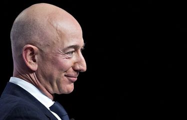 Jeff Bezos, founder and chief executive officer of Amazon.com Inc., listens during a discussion at the Air Force Association’s Air, Space and Cyber Conference in National Harbor, Maryland, U.S., on Wednesday, Sept. 19, 2018. Amazon is considering a plan to open as many as 3,000 new AmazonGo cashierless stores in the next few years, according to people familiar with matter, an aggressive and costly expansion that would threaten convenience chains. Photographer: Andrew Harrer/Bloomberg 775230539
