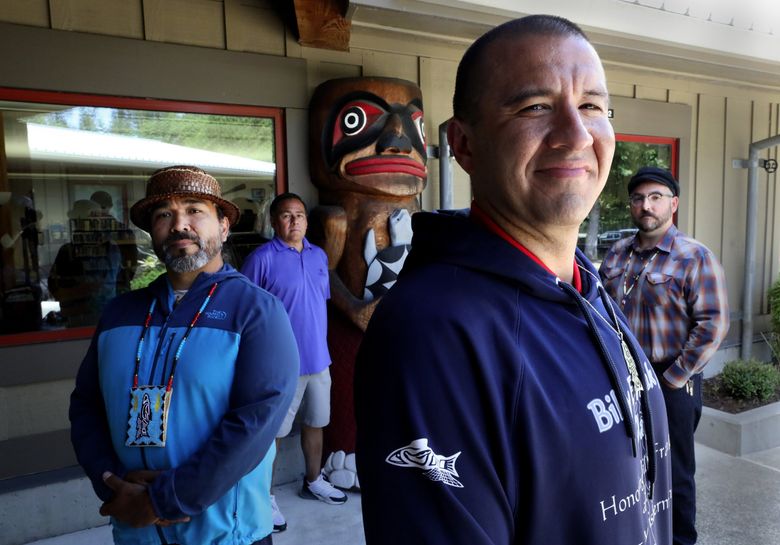 Hanford McCloud, left, Bill Kallappa, Willie Frank III and Jerad Koepp at the Wa-He-Lut Indian School at Frank’s Landing.  All are happy to see changes made in school mascots, unless those mascots are done with tribe’s and nation’s cooperation and approval. (Alan Berner / The Seattle Times)
