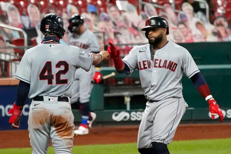 Cleveland Indians pitcher Carlos Carrasco throws live batting