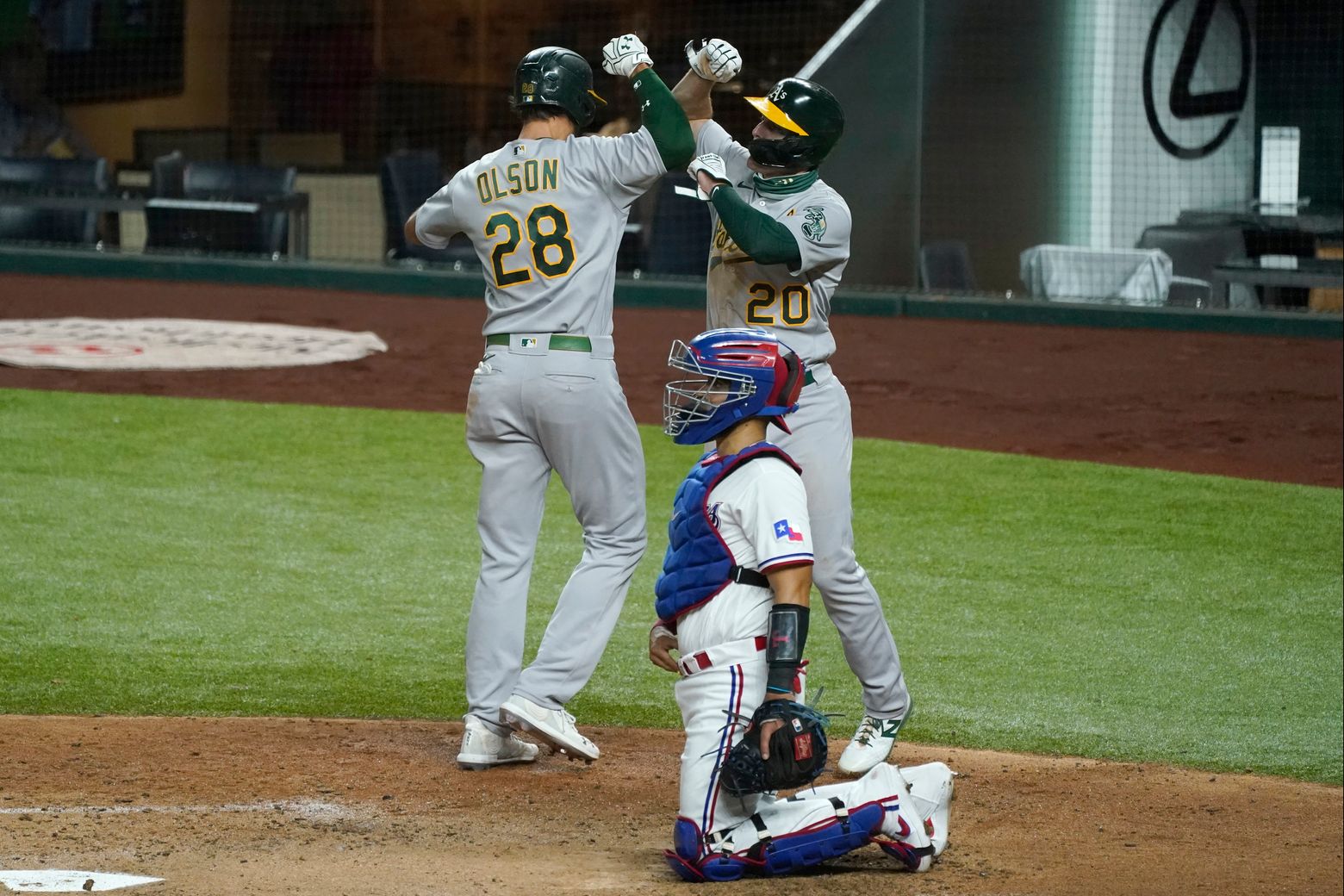 Oakland A's infielders Marcus Semien, Matt Chapman, and Matt Olson