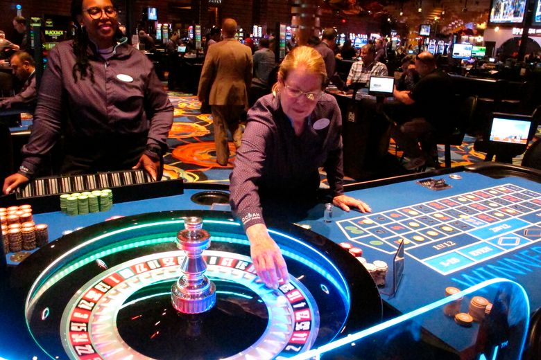 Dealers carry out a game of roulette at the Ocean Casino Resort in Atlantic City N.J. on June 18, 2019. In a lawsuit filed Thursday, Aug. 27, 2020, Atlantic City’s top casino, the Borgata, accuses Ocean Casino Resort of poaching its top marketing executives, including one with a cell phone containing priceless information on the Borgata’s top customers, who spend $1.5 million to $4 million per visit. (AP Photo/Wayne Parry)