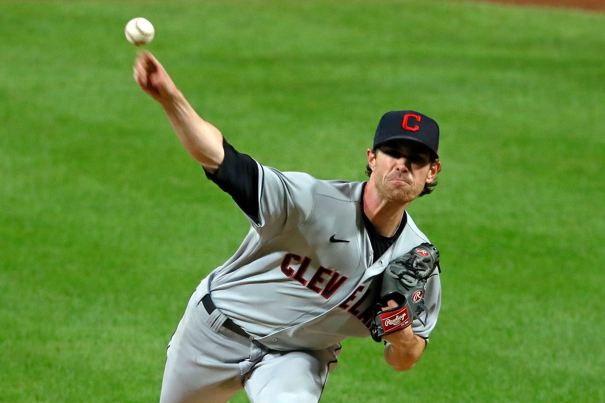 Pitcher Bob Feller of the Cleveland Indians seen here striking an