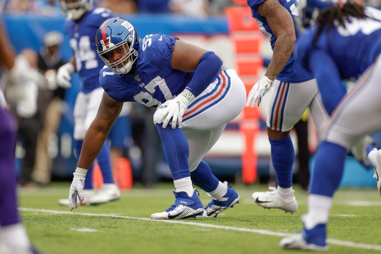 New York Giants defensive tackle Dexter Lawrence (97) takes the field for  an NFL football game against the Philadelphia Eagles on Sunday, Dec. 11,  2022, in East Rutherford, N.J. (AP Photo/Adam Hunger