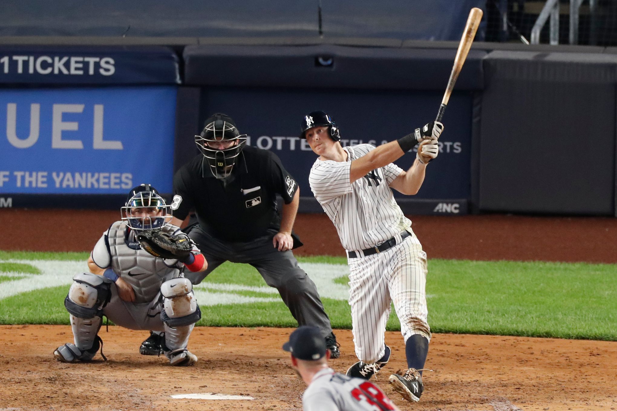 New York Yankees' DJ LeMahieu follows through on an RBI single