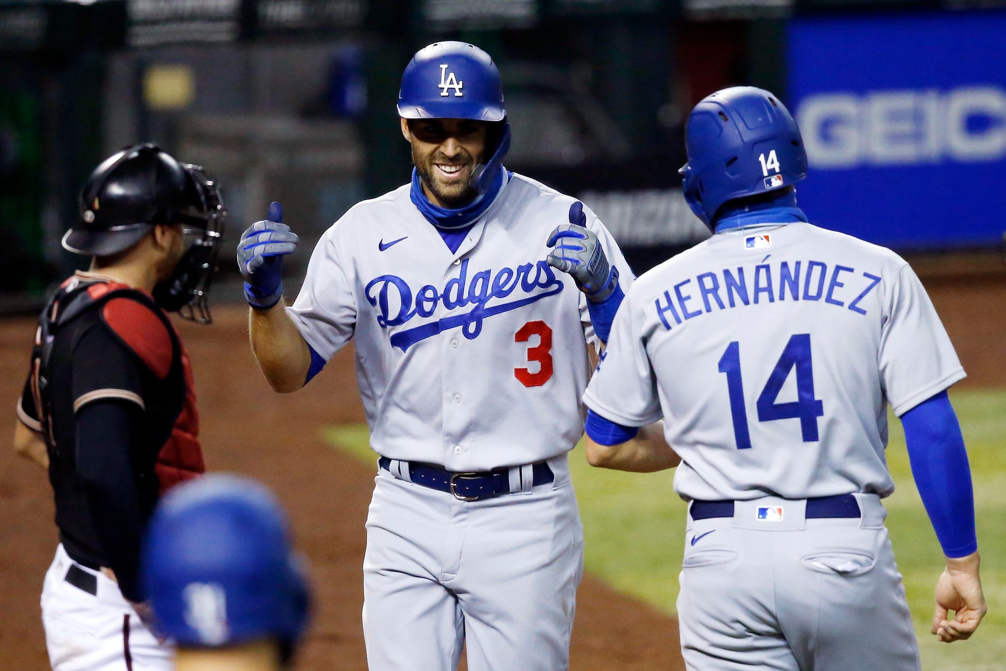 Los Angeles Dodgers' Edwin Rios, right, celebrates with Corey
