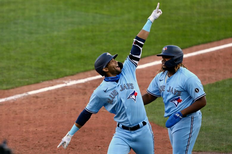 Gurriel chops Blue Jays to 3-2 win over Phillies in Game 1 - The San Diego  Union-Tribune