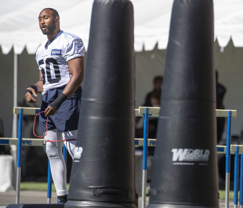 Former Seattle Seahawks NFL football linebacker K.J. Wright takes a penalty  kick after he was fouled while playing in the MLS soccer Seattle Sounders'  media match, Friday, Sept. 2, 2022, in Seattle.