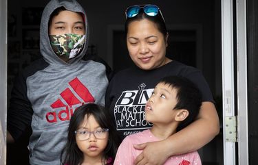 Maria Paras and her kids, clockwise from left, Kyle, 12, Kian, 8, and Kaycee, 6, are facing a scheduling dilemma as school moves to online learning due to the coronavirus pandemic. Paras and her husband, who are both employed by Seattle Public Schools, have to work on-site at the same time their kids are tasked with a strict schedule of live online classes. The links for each of the kids’ classes come separately to her personal email, which makes it very difficult to keep straight, she said.

Friday September 11, 2020. 215038