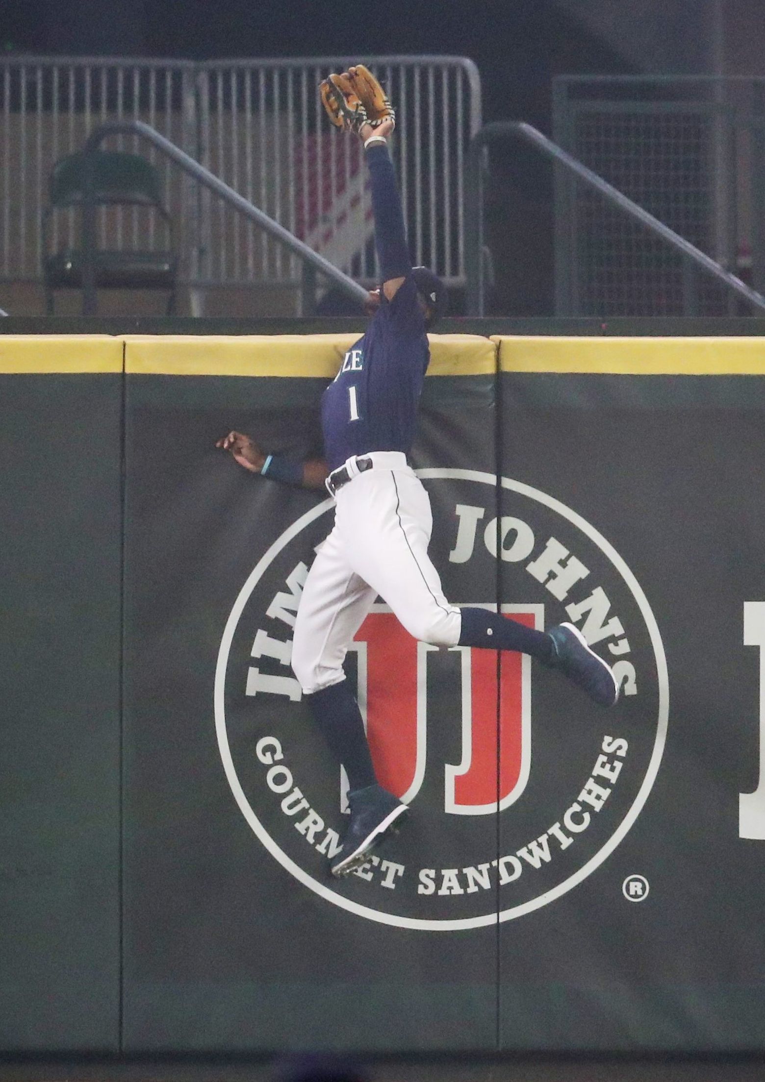 Julio Rodriguez of the Seattle Mariners celebrates with Kyle Lewis