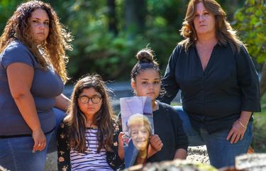 Tyffani Murillo, her daughters Rylie Dickinson, 9, and Emmie Dickinson, 12, with their grandmother Kareen Huffman are photographed near some freshly cut trees on Huffman’s property in Lake Stevens. The young granddaughters are holding a photograph of their great grandma Darlene Mach who passed away earlier this year at the age of 83. The girls great-great grandmother, Kathleen Chappell died last year at the age of 103. 

Photographed on September 22, 2020.  215100