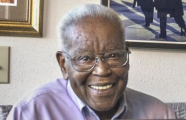 Tacoma’s first black mayor, Harold Moss, holds a portrait of Barack Obama, the first African-American president , part of a collection of images and mementos that hang in a room of the Moss household reserved for the 44th president and his family. Moss, a former head of the local NAACP chapter and a civil rights activist says he isolated himself at home on election night in 2008. “I was scared and I wanted to be by myself. I just did not want to experience what it would be like to have him (Obama) fail,” said Moss. “The part of it that really just broke me up was we always talk about standing on each others shoulders. Well on that night I could feel the weight of the president on my shoulders. That I had been part of what had brought that about,” Moss said Jan. 12, 2017.