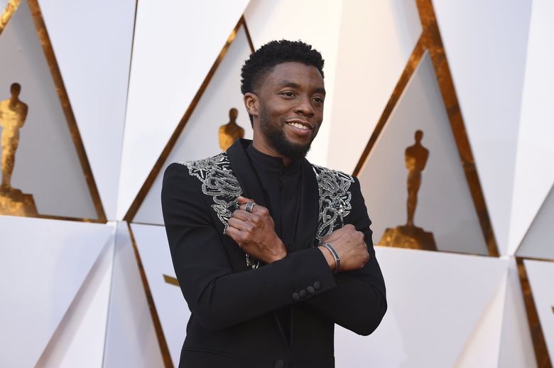 In this March 2018 file photo, Chadwick Boseman arrives at the Oscars at the Dolby Theatre in Los Angeles. Boseman, who played Black icons Jackie Robinson and James Brown before finding fame as the regal Black Panther in the Marvel cinematic universe, died of colon cancer Friday, Aug. 28, 2020. He was 43. (Jordan Strauss / Invision / The Associated Press)