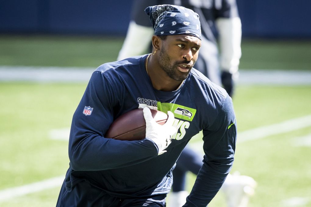 Seahawks wide receiver DK Metcalf warms up before the Seahawks’ mock game Aug. 22 at CenturyLink Field. (Bettina Hansen / The Seattle Times)