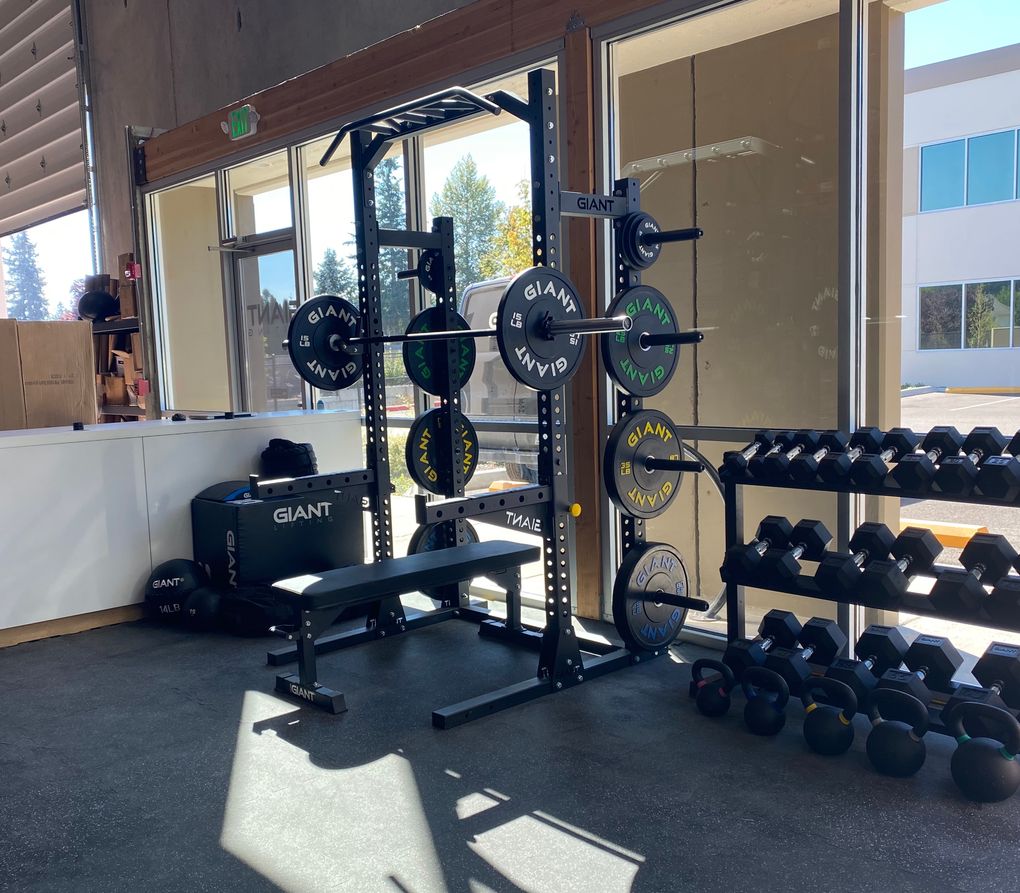 A power rack and free weights are versatile equipment you can do many exercises with. (Courtesy of Giant Lifting)