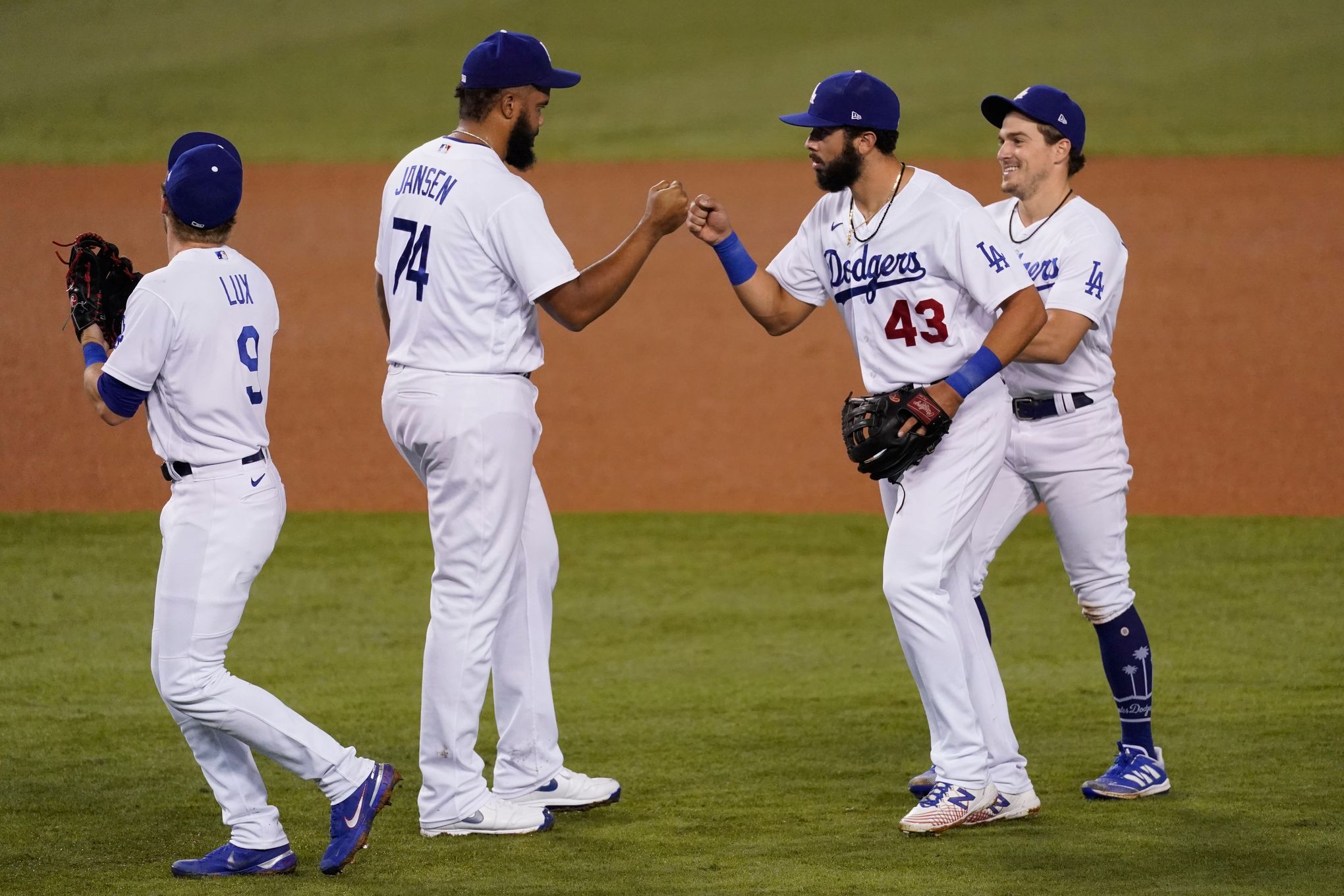 Los Angeles Dodgers' celebrate in the ninth inning after Will Smith hit a  solo home run to give the Dodgers their second walk-off win in four days  with a 4-3 victory over