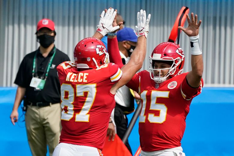 Kansas City Chiefs quarterback Patrick Mahomes (15) and strong