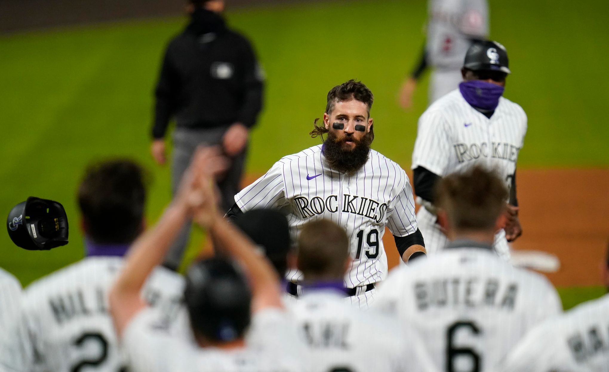 Colorado Rockies right fielder Charlie Blackmon hits a two-run