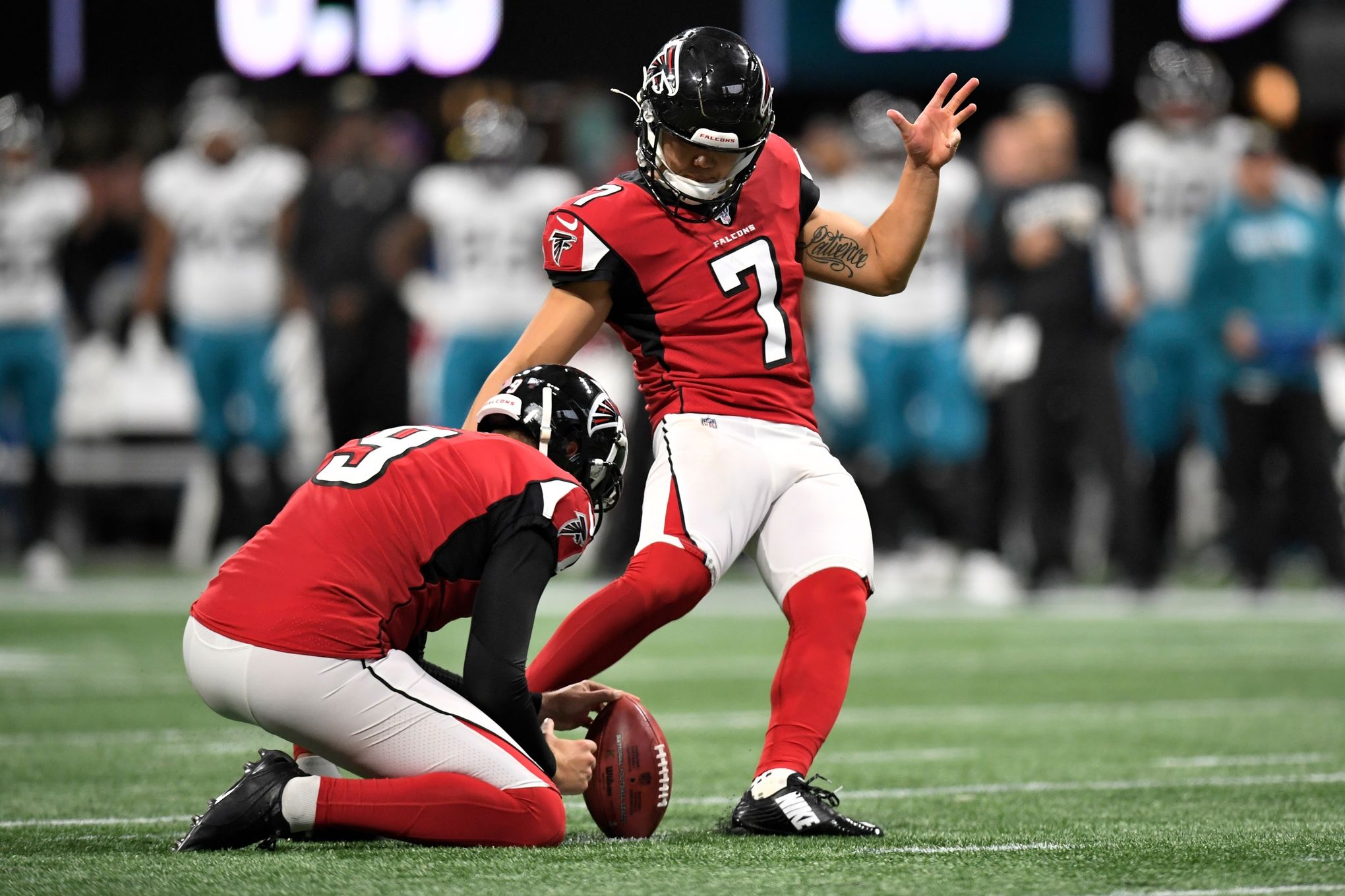 Atlanta Falcons kicker Younghoe Koo (7) of South Korea, walks the