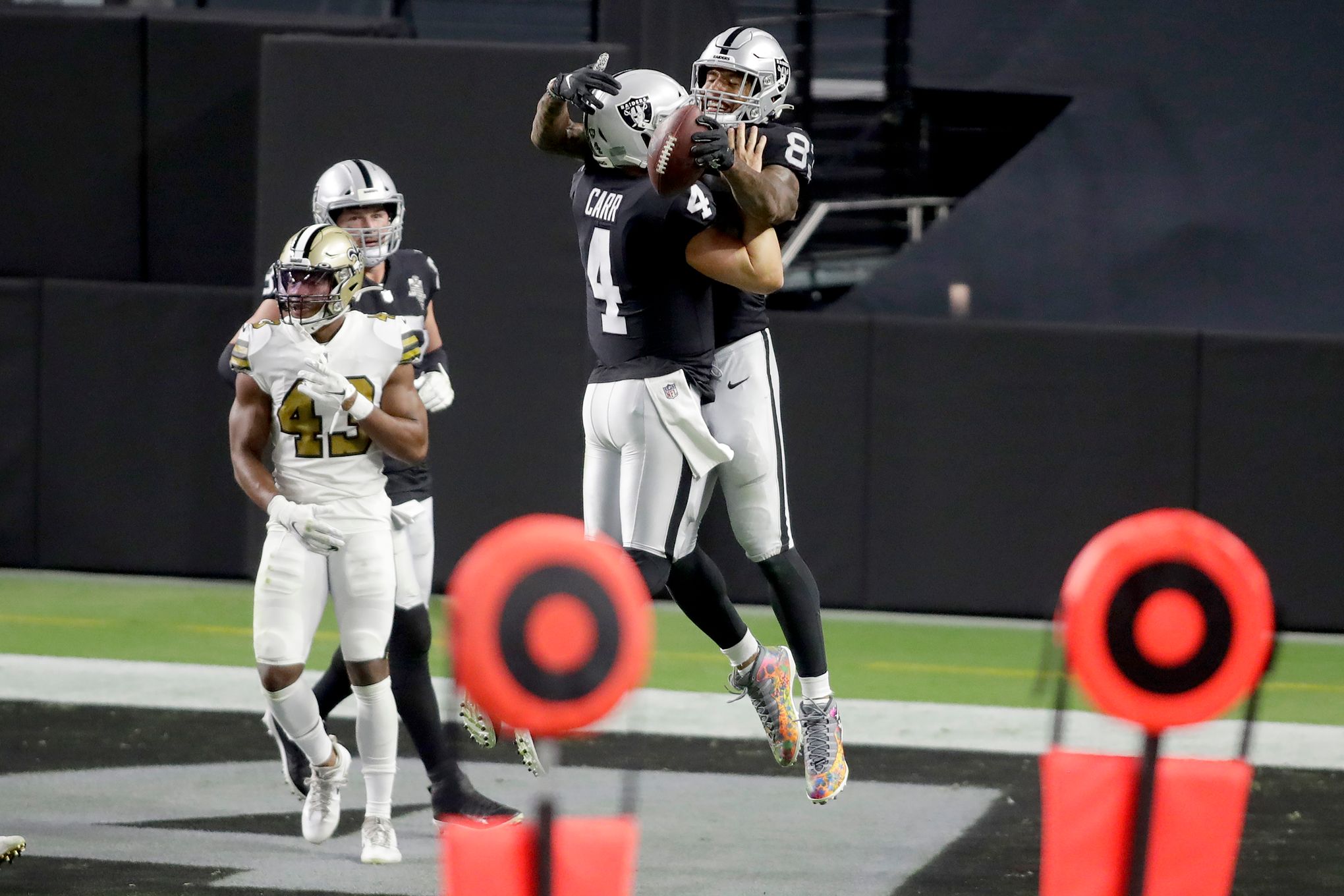 Raiders open Las Vegas stadium with 34-24 win vs Saints