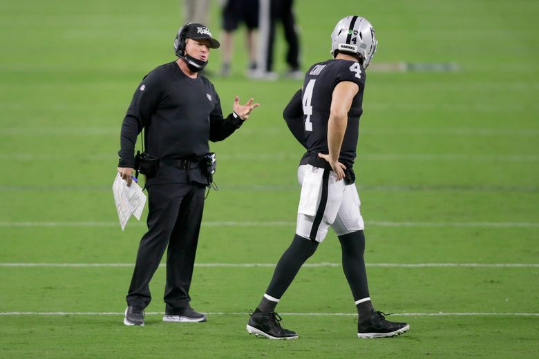 Derek Carr of Oakland Raiders helped off field with lower right