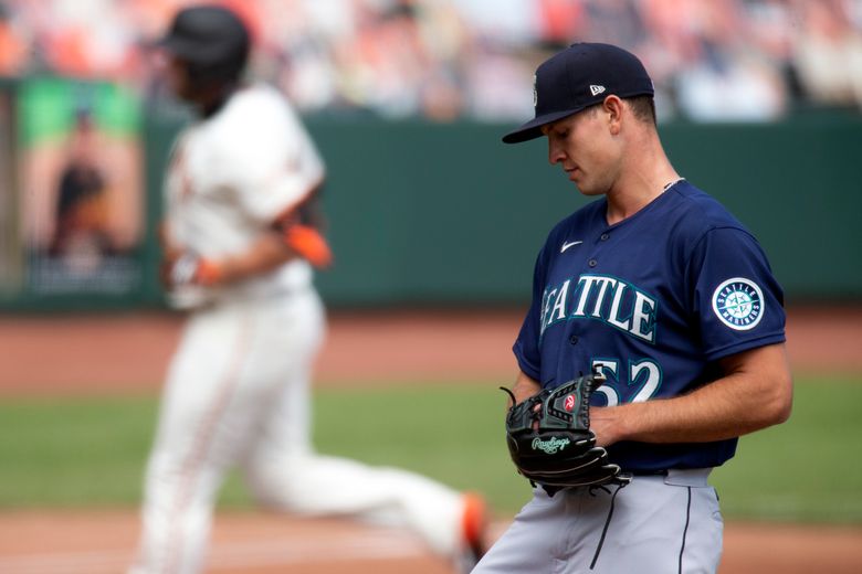 Kyle Seager of the Seattle Mariners reacts in the dugout during