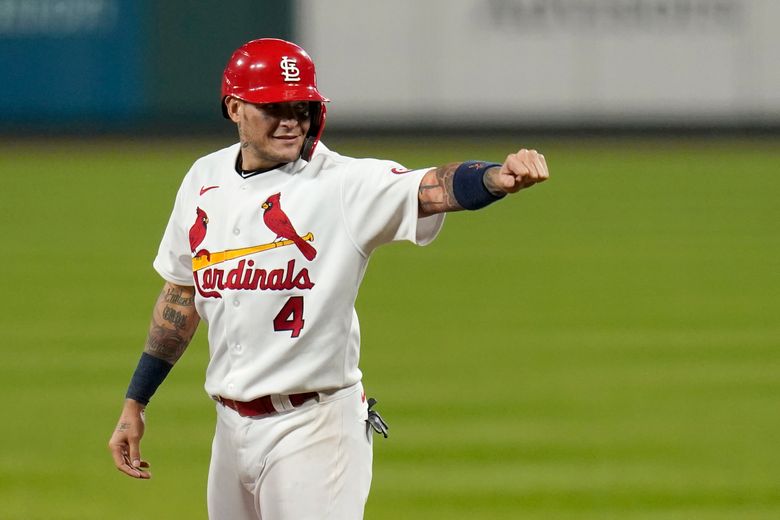 St. Louis Cardinals' Yadier Molina celebrates after hitting a two