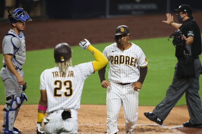 San Diego Padres' Trent Grisham reacts after hitting a home run