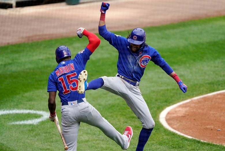 Chicago Cubs' Patrick Wisdom, right, celebrates with Anthony Rizzo