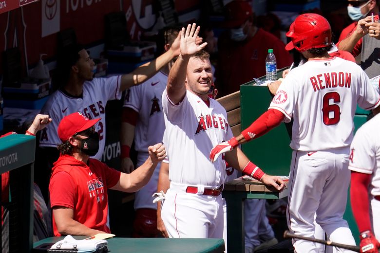 Trout breaks Angels' HR record in third inning against Astros.
