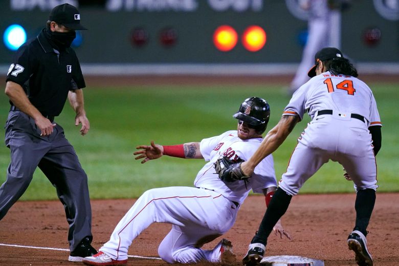 Pat Valaika of the Baltimore Orioles reacts after striking out