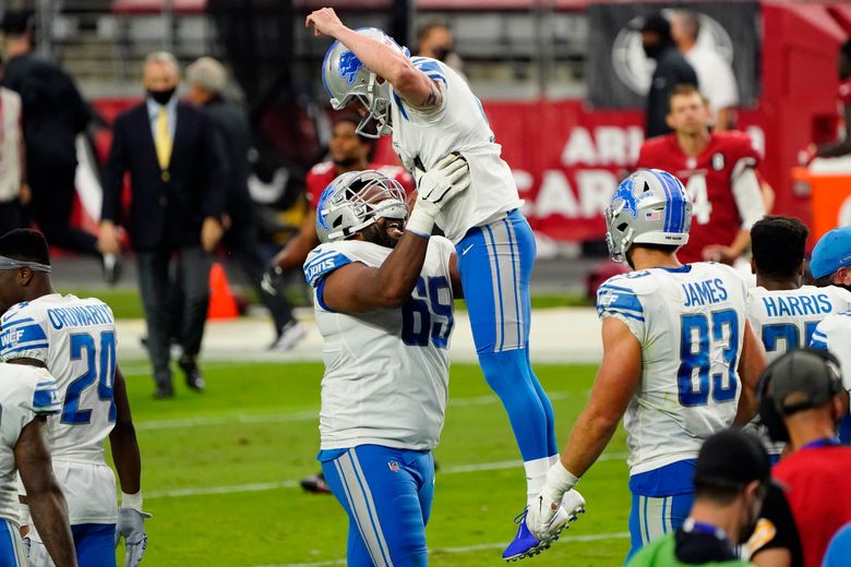 Jeff Okudah of the Detroit Lions celebrates after defeating the