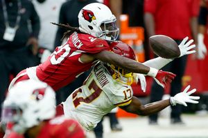 Murray runs for 2 TDs, Cardinals roll past Washington 30-15