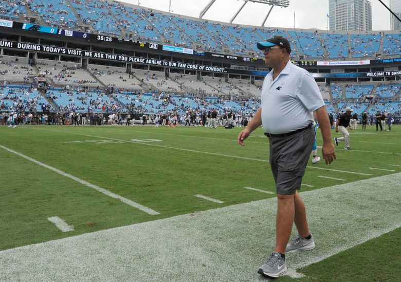 Carolina Panthers players push owner David Tepper for grass field