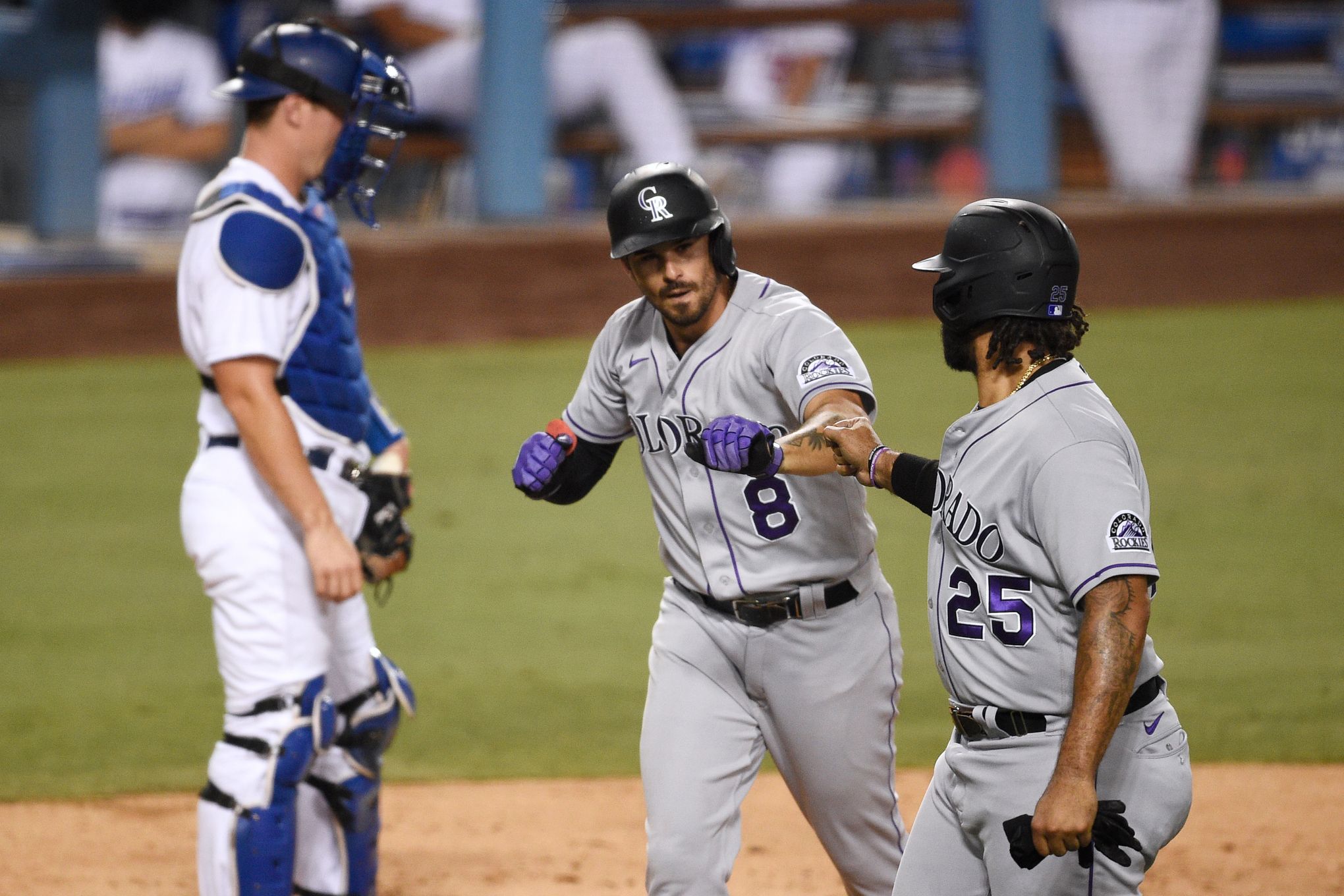 Rockies use clutch hitting to down Dodgers