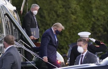 President Donald Trump arrives at Walter Reed Medical Center in Bethesda, Md., after testing positive for COVID-19, Oct. 2, 2020. A timeline of events about the president’s illness is drawn from his tweets, news conferences, statements from the White House and reporting from The New York Times. (Doug Mills/The New York Times) XNYT104 XNYT104