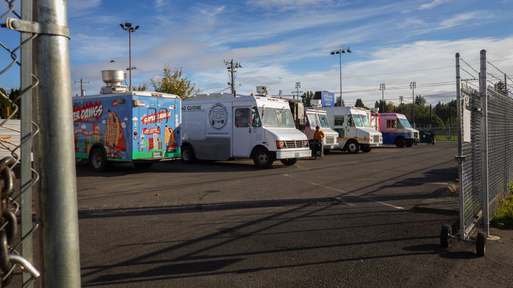 The COVID-19 pandemic idled many food trucks, but some of the trucks at Chop Kitchens are staying afloat, buoyed by creative maneuvering and sporadic business. (Ellen M. Banner / The Seattle Times)