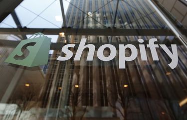 Signage is displayed on the Shopify Inc. headquarters in Ottawa, Ontario, Canada, on Thursday, May 7, 2020. Ottawa-based Shopify edged past Royal Bank of Canada to become the largest publicly listed company in Canada. Photographer: David Kawai/Bloomberg 775511027