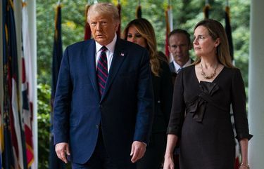 FILE — President Donald Trump and Judge Amy Coney Barrett, his nominee to the Supreme Court, walk out to the Rose Garden of the White House in Washington, for his public announcement, Sept. 26, 2020. As the Senate confirmation hearings have made clear, the image Barrett is trying to project is pretty much the opposite of “notorious.” (Al Drago/The New York Times) XNYT62 XNYT62
