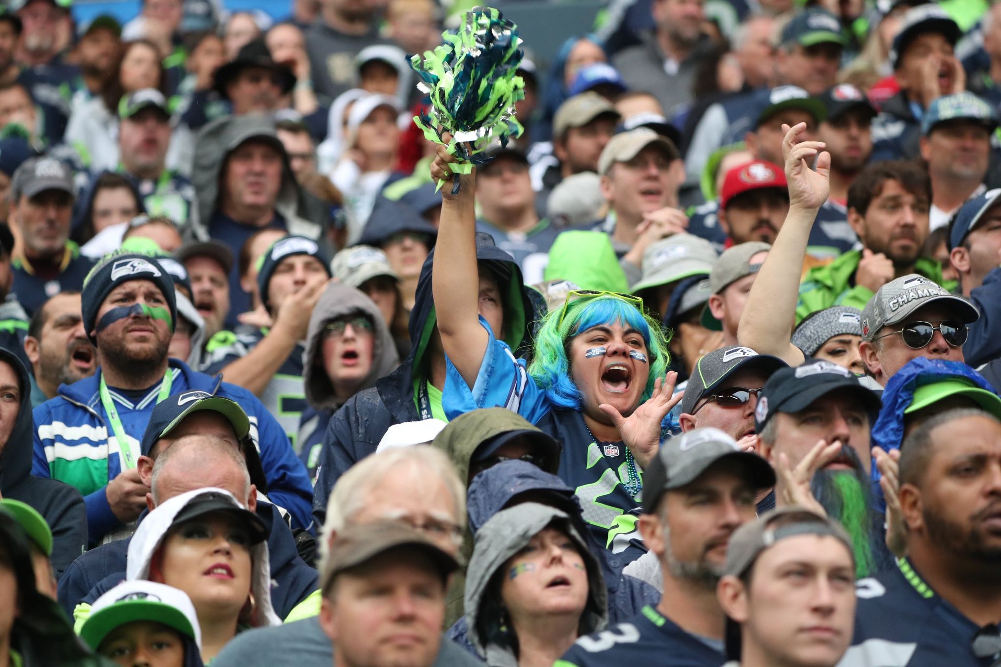 Fellowship of fans & players at Seahawks Christmas game - Sports Illustrated