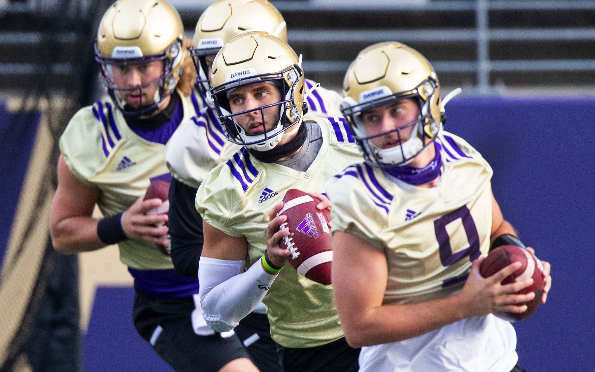 NCAA - University of Washington Football: Two Lower Level Corner