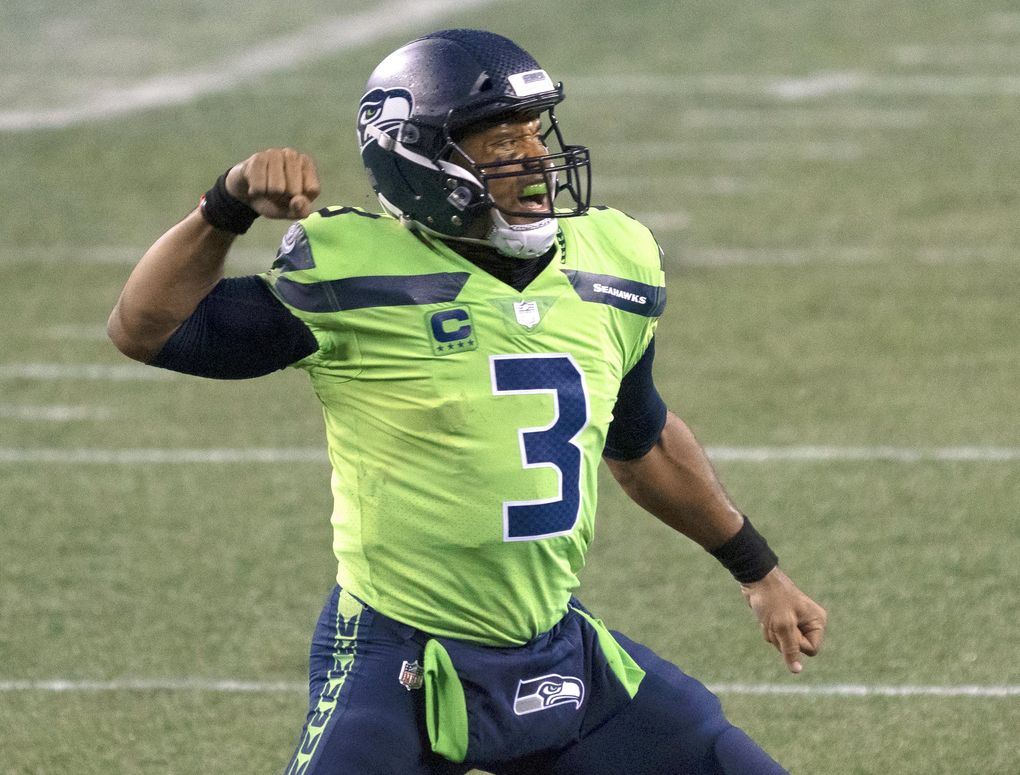 Seattle Seahawks quarterback Russell Wilson reacts after throwing the game winning touchdown during the second half of an NFL football game against the Minnesota Vikings, Sunday, Oct. 11, 2020, in Seattle. The Seahawks won 27-26. (Stephen Brashear / AP)