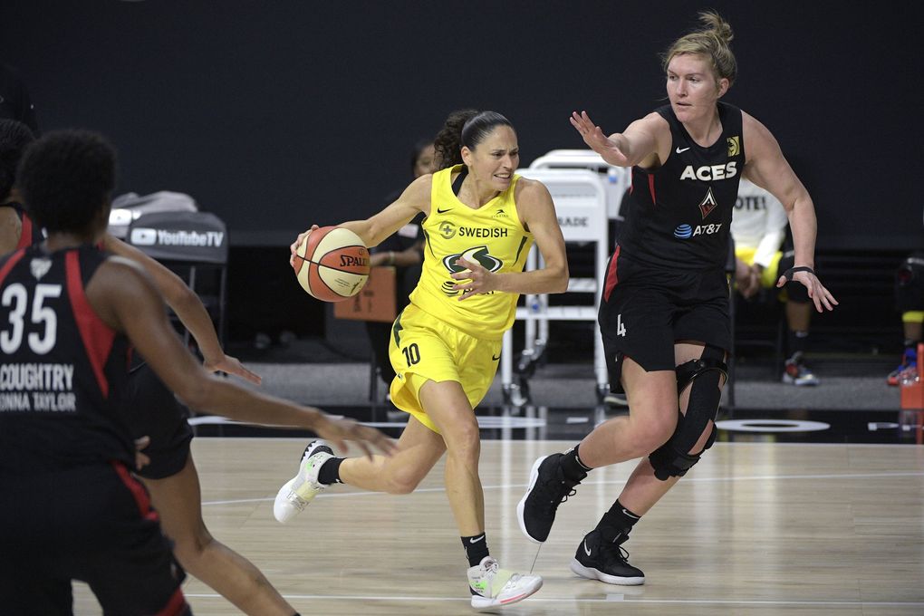 Seattle Storm guard Sue Bird (10) drives to the basket in front of Las Vegas Aces center Carolyn Swords (4) during the second half of Game 2 of basketball’s WNBA Finals, Sunday, Oct. 4, 2020, in Bradenton, Fla. (Phelan M. Ebenhack / The Associated Press)