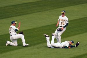 Pinder delivers timely hit, A's advance in playoffs at last a