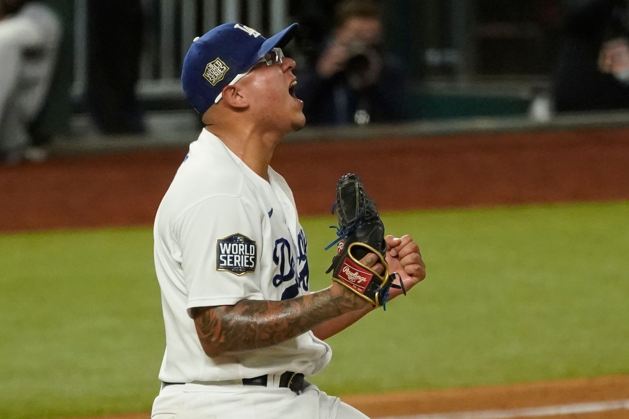 Los Angeles Dodgers pitcher Julio Urias celebrates the end of the