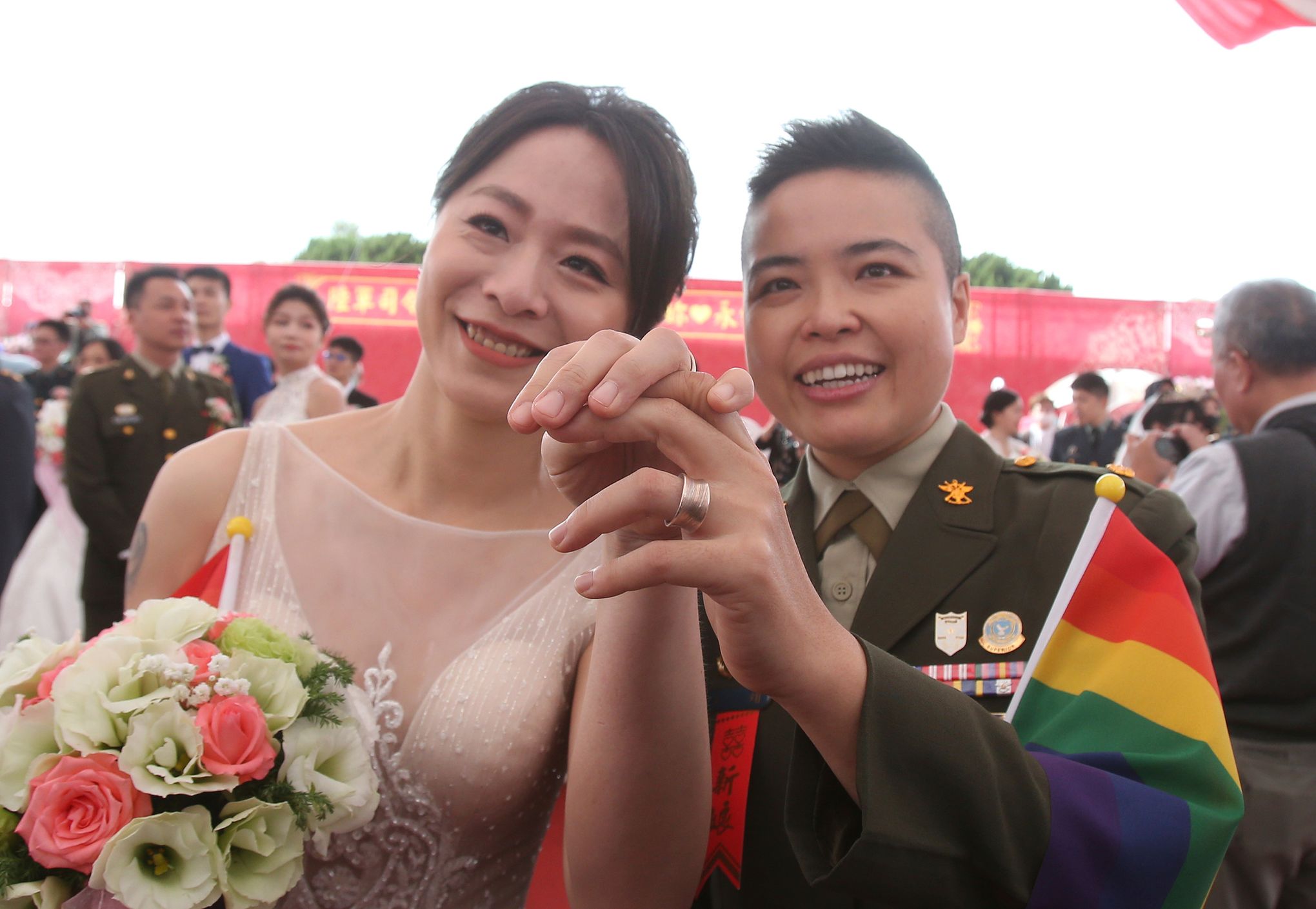 Two same-sex couples in military marry in first for Taiwan | The Seattle  Times